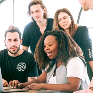 woman-sharing-her-presentation-with-her-colleagues-3153198